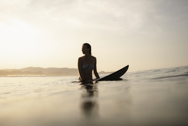 surfer looking at horizon