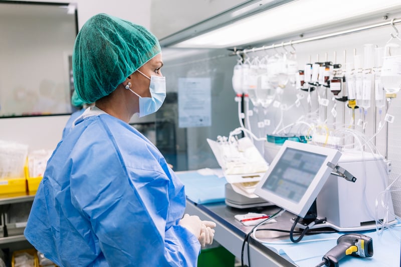 healthcare data person at a lab with scrubs on