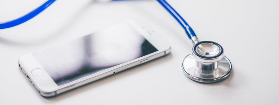 iphone next to a stethoscope