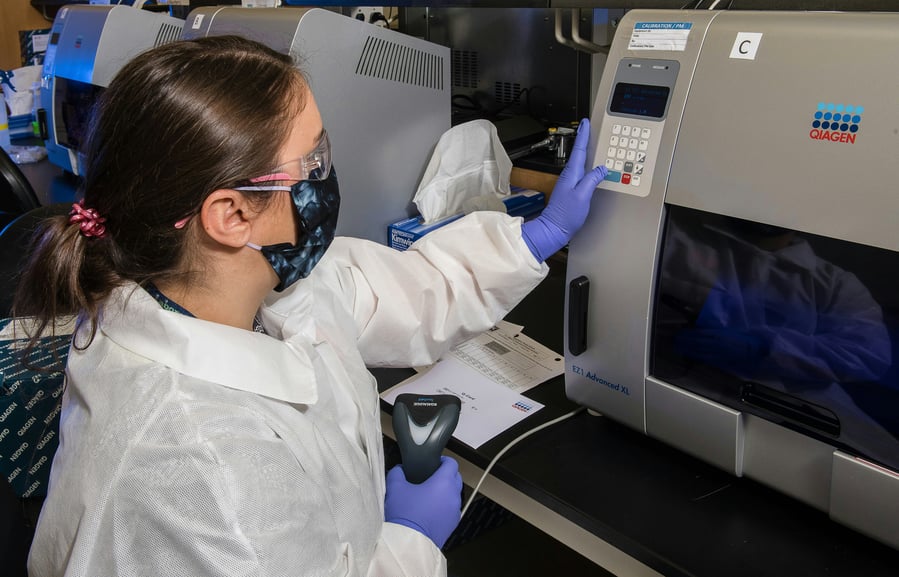 scientist testing machine